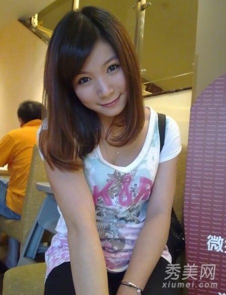 90后奥运冠军喜欢自拍。何姿的私人发型纯粹而随意。