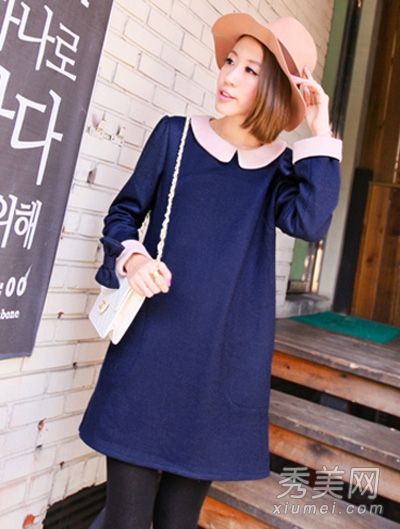 这种新的羊毛连衣裙被推荐为冬季的必备单品。