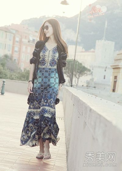 春夏长裙的时尚搭配解决了温差身材的问题。