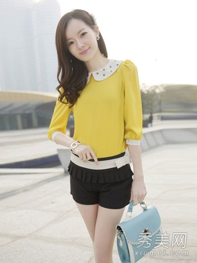 2013年夏装搭配雪纺衬衫和短裤的照片