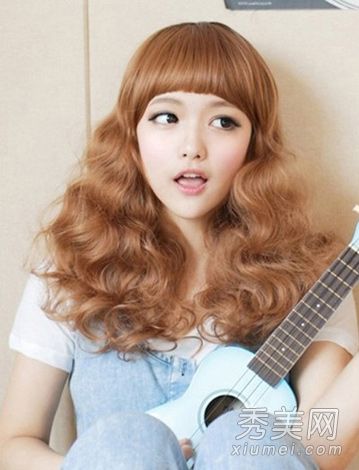 2013年最流行的烫发是蛋卷和梨子烫发。