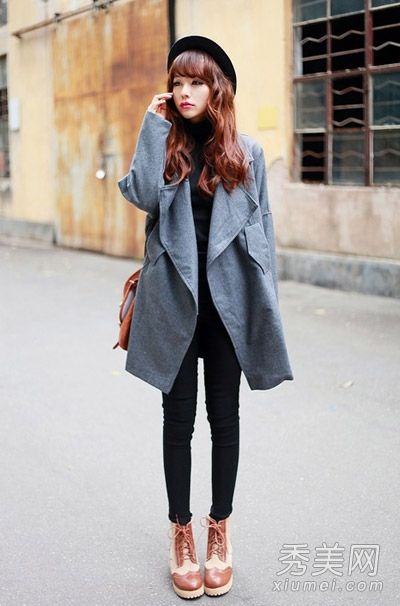 韩版风衣搭配紧身裤，干练优雅。