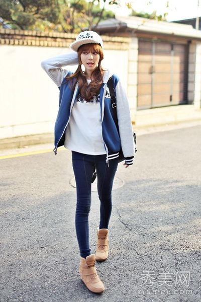 韩国的宽松背心用途广泛，能抵御初冬的严寒