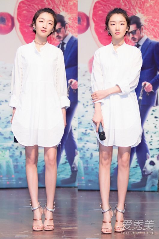 像你一样,周东宇无法控制如何穿衬衫裙子。