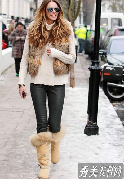 穿着高统靴有助于打造完美的身材比例。