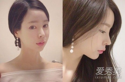 韩牛手里拿着一对象牙珍珠耳环。